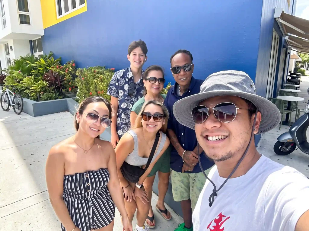 Ron traveling with shuttle passengers in Belize